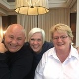 Three People Smiling